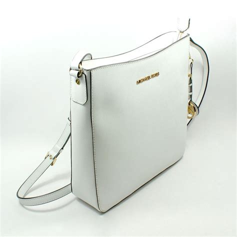 white michael kors purse with mk logo|Michael Kors white small crossbody.